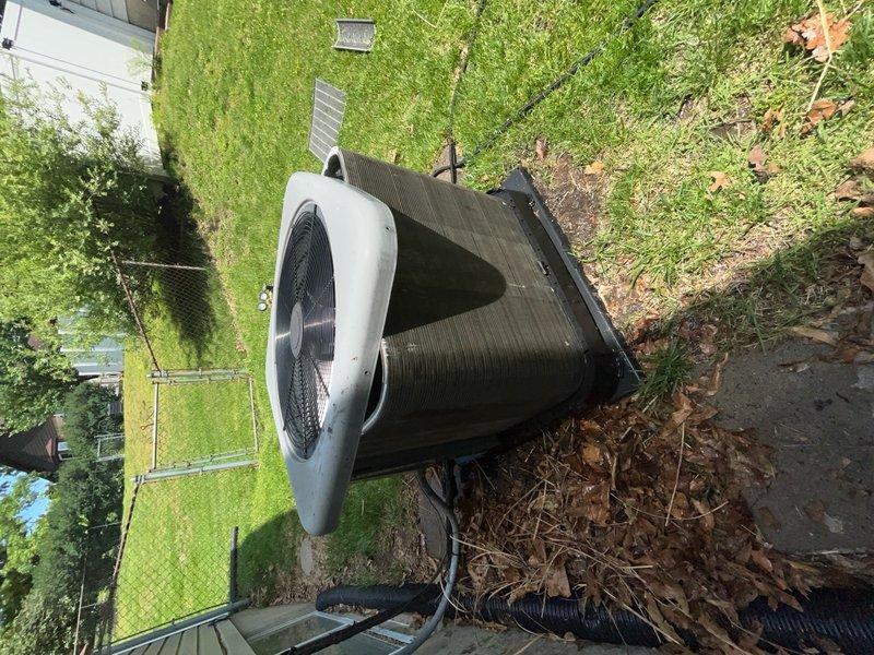 Completed comprehensive cooling season tune-up on 8-year-old residential split system air conditioning unit. Performed inspection and maintenance of outdoor condenser unit located at ground level and indoor air handler components, including thorough examination of blower wheel assembly which showed normal dust accumulation for unit age. Verified system operation, cleaned condenser coils, checked refrigerant levels, tested electrical connections, and ensured all components were functioning within manufacturer specifications for optimal cooling performance.