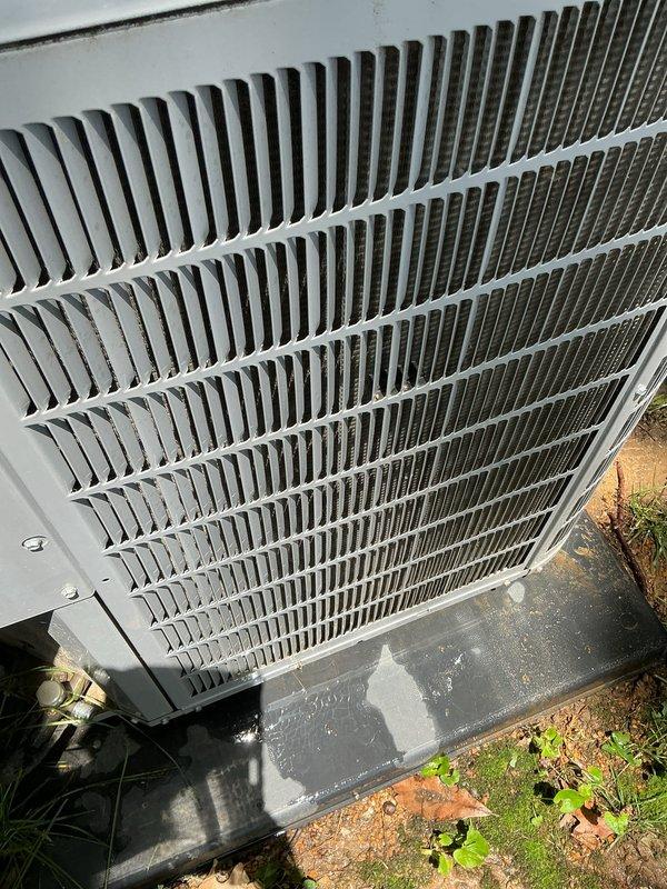 Responded to service call for water leaking from condensate drain on 9-year-old residential air conditioning system. Upon arrival, inspected outdoor condenser unit and indoor Carrier furnace with cooling coil. Found condensate drain line clogged, causing water backup and overflow. Cleared blockage from drain line using appropriate methods, verified proper drainage flow, and tested system operation. Checked refrigerant levels, electrical connections, and overall system performance to ensure proper functioning. Customer advised that clogged drain was likely contributing to water waste and elevated water bill. System now operating normally with condensate draining properly.
