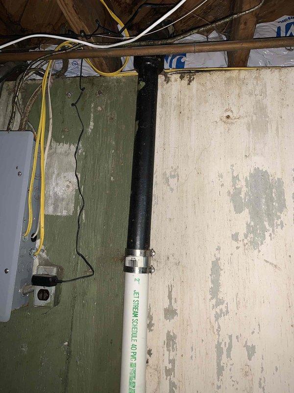 Responded to double kitchen sink backup affecting both basins following garbage disposal use. Inspected disposal unit, confirmed motor operation but drainage system was obstructed. Accessed drain lines beneath sink and in basement area, identifying blockage in shared drain pipe downstream of disposal connection. Cleared obstruction using mechanical snake through cleanout access point, removed accumulated debris and food particles causing the backup. Tested both sink basins and garbage disposal unit for proper drainage, verified water flow restored to normal operation throughout entire system. Recommended periodic maintenance to prevent future accumulation in aging drain lines.