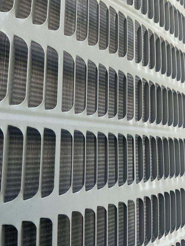 Completed comprehensive cooling system tune-up on 16-year-old raised basement unit. Performed standard maintenance protocol including condenser coil inspection, which showed clean fins and coils in good condition, and replaced dirty air filter with fresh pleated media filter. Verified system operation and discussed preventive maintenance agreement renewal options.