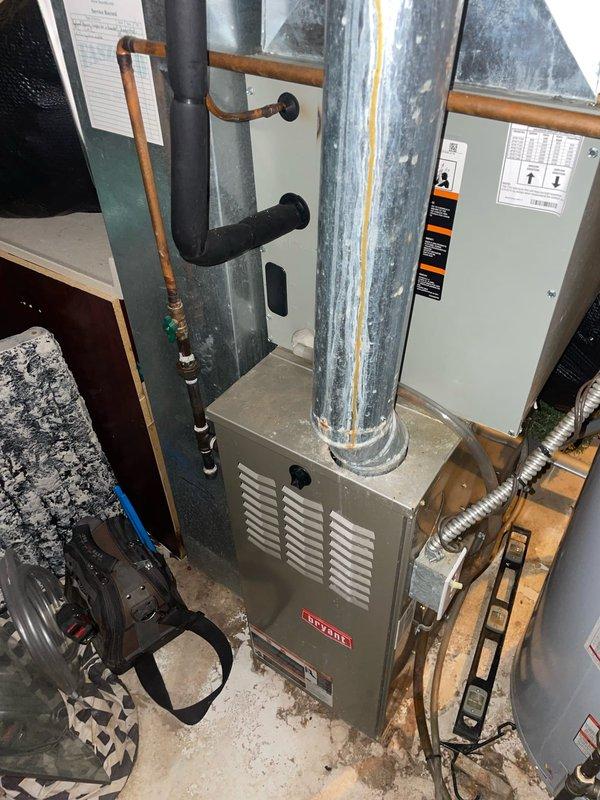 Completed comprehensive cooling system tune-up on 3-year-old Bryant HVAC unit located in basement mechanical room. Performed standard maintenance protocol including inspection of all system components, refrigerant lines, electrical connections, and ductwork; verified thermostat operation and calibration at 65°F cooling setpoint. All equipment found operating within normal parameters with no deficiencies noted at time of service.