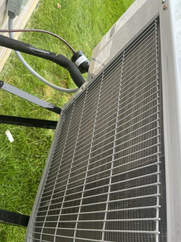 Completed comprehensive tune-up service on residential air conditioning system located at exterior of home. Performed electrical diagnostics using digital multimeter to test voltage and amperage at disconnect box and contactor assembly, verified proper electrical connections and component operation. Inspected condenser unit including coils, refrigerant lines, and overall system condition to ensure optimal performance for cooling season.