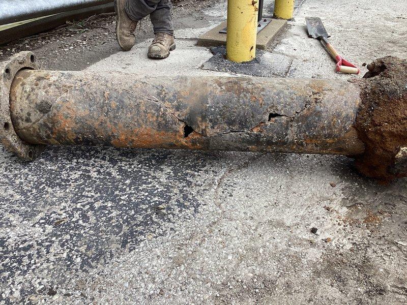 Performed water service line repair involving excavation and replacement of severely corroded piping. Excavated trench to expose existing black industrial water service pipe that exhibited extensive rust, corrosion, and structural deterioration throughout its length. Removed compromised pipe section from trench, which showed significant pitting, oxidation, and surface degradation due to prolonged exposure to moisture and soil conditions. Replaced deteriorated piping with new water service line to restore proper water delivery and prevent service interruption. Backfilled excavation upon completion of installation.