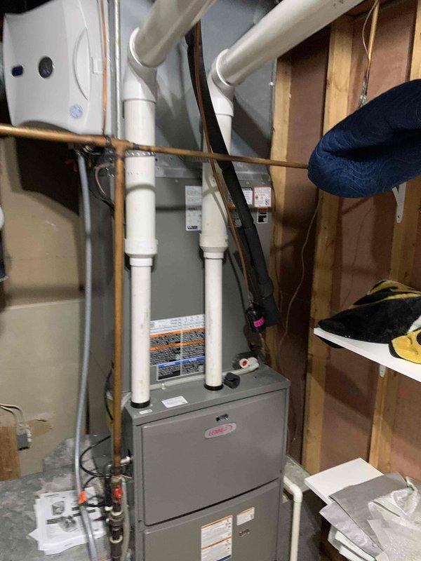 Responded to no cooling complaint on residential air conditioning system less than 10 years old located in side yard. Upon arrival, confirmed outdoor unit fan was operating but system was not producing cool air. Performed diagnostic evaluation of refrigeration circuit and electrical components. Inspected indoor evaporator coil, furnace connections, and associated copper line set for proper installation and refrigerant flow. Examined outdoor condensing unit service valves, brass fittings, and refrigerant connections for leaks or restrictions. Verified proper voltage and amperage to compressor and fan motor. System restored to normal cooling operation.