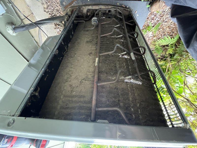 Completed comprehensive AC tune-up on 13-year-old Trane cooling system. Performed full system inspection, cleaned condenser coil of accumulated dust and debris, checked refrigerant levels, tested capacitor and electrical connections, verified proper operation of all components. Unit operating within normal parameters with no issues identified.