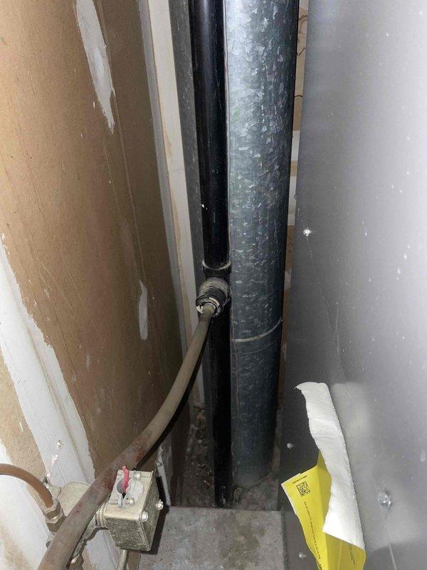 Responded to service call for air conditioning unit experiencing excessive water leakage on a six-year-old system. Upon arrival, performed diagnostic inspection of the indoor air handler and condensate drainage system. Found the primary condensate drain line was completely blocked, causing water to overflow from the drain pan. Cleared the obstruction using appropriate drain cleaning methods and verified proper drainage flow. Inspected the condensate pump, drain pan, and associated piping for damage or additional issues. Tested the system operation to confirm proper condensation removal and verified no further leaking occurred. Unit restored to normal cooling operation with proper water drainage functionality.