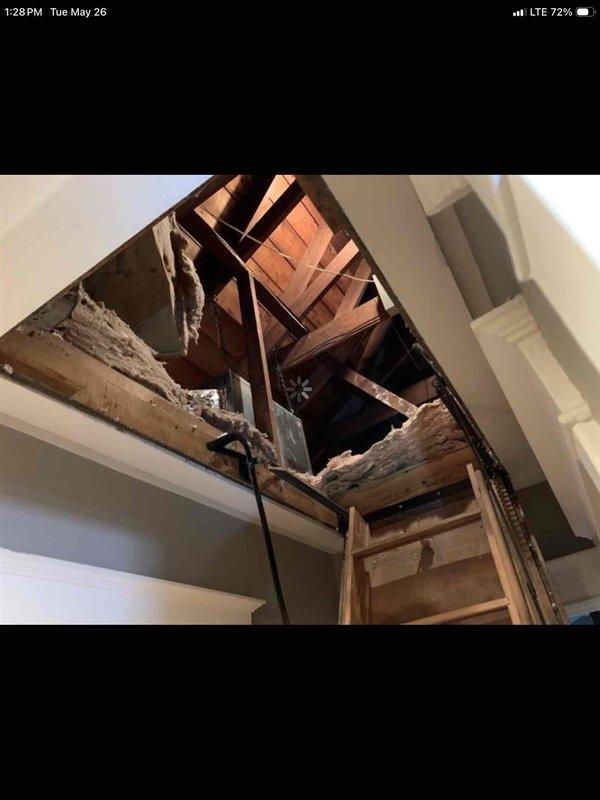 Responded to no-cool call on 12-year-old Unico high-velocity system located in attic with outdoor unit not running despite indoor fan operation and history of coil/line blockages that previous companies were unable to resolve. Accessed attic via pull-down ladder, inspected air handler and associated ductwork, and documented equipment condition with photos for further diagnostic assessment.
