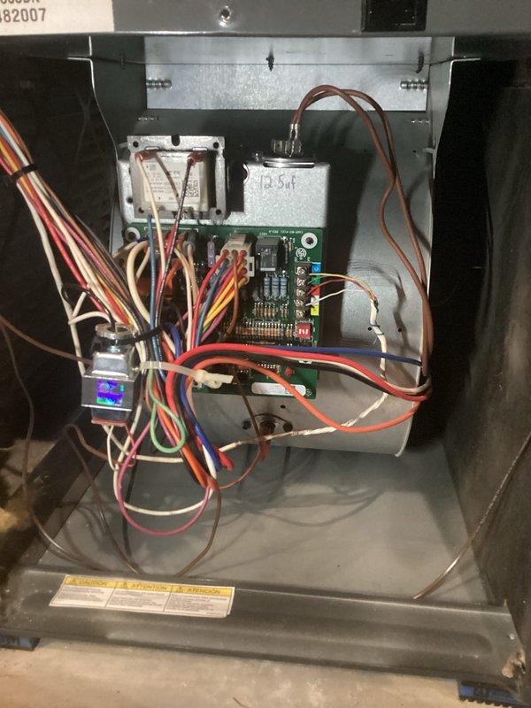 Completed comprehensive cooling system tune-up on single AC unit located in side yard. Performed standard maintenance protocol including inspection of electrical components, control board, capacitor, and relay connections; verified proper operation of digital display module and all wire harnesses. Replaced 20x25x1 air filter and confirmed all system components functioning within normal parameters.