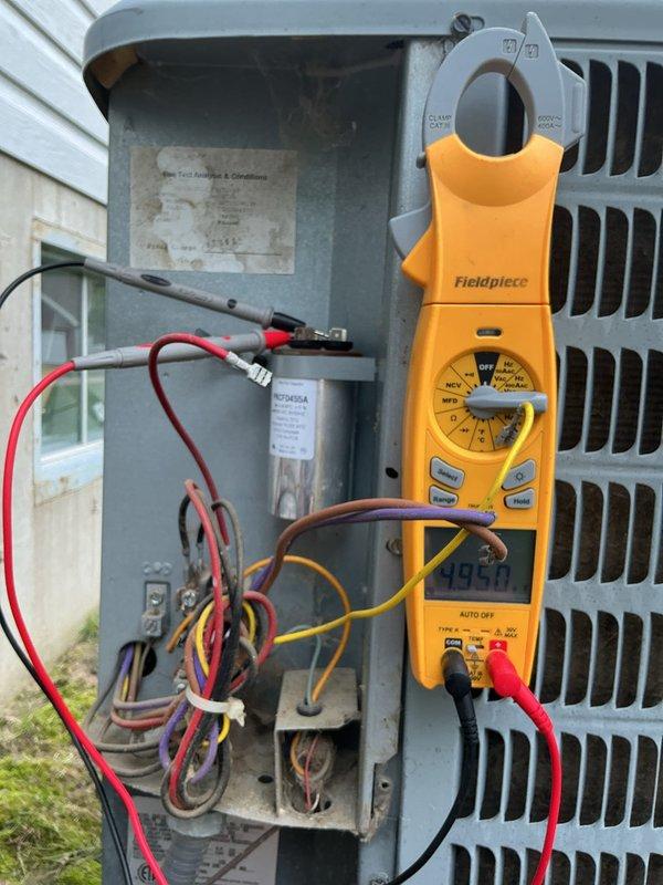 Responded to no cooling complaint on residential air conditioning system. Upon arrival, performed diagnostic testing using digital manifold gauges to check refrigerant pressures and temperatures. Conducted electrical diagnostics on outdoor condensing unit, testing capacitor and electrical connections with clamp meter. Found system had been shut off by customer prior to arrival. Completed full system evaluation to identify root cause of cooling failure and provided repair recommendations to restore proper operation.