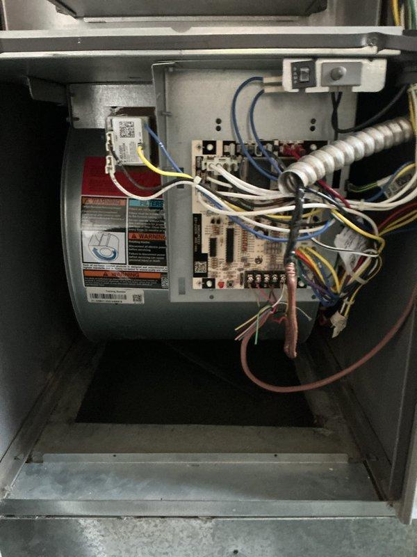 Completed cooling system tune-up and maintenance on a 9-year-old Trane unit. Inspected blower motor assembly, electrical connections, and control board; all components found operating within normal parameters. Documented dirty air filter requiring replacement and verified system cooling performance satisfactory.