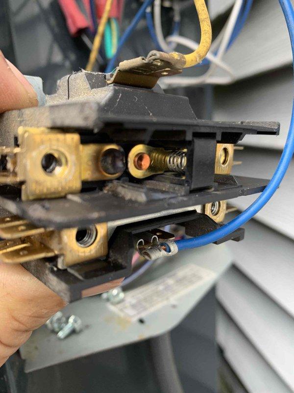 Responded to no cooling call on U10 unit located at side of home following multiple previous service visits. Upon inspection, diagnosed failed contactor relay preventing unit from energizing. Removed defective contactor assembly showing signs of electrical wear and oxidation on brass terminals and replaced with new component to restore proper operation and cooling function.