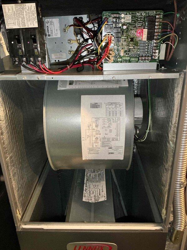 Completed annual cooling system tune-up on a 9-year-old Lennox outdoor condensing unit. Performed comprehensive maintenance including inspection of electrical components, control board, and wiring connections; cleaned heavily soiled condenser coils and exterior fins; checked refrigerant levels and operating pressures; verified proper operation of compressor and condenser fan motor; and tested all safety controls and thermostat response. Unit returned to normal operating condition with improved efficiency following removal of accumulated dirt, debris, and vegetation buildup from exterior surfaces and heat exchange components.