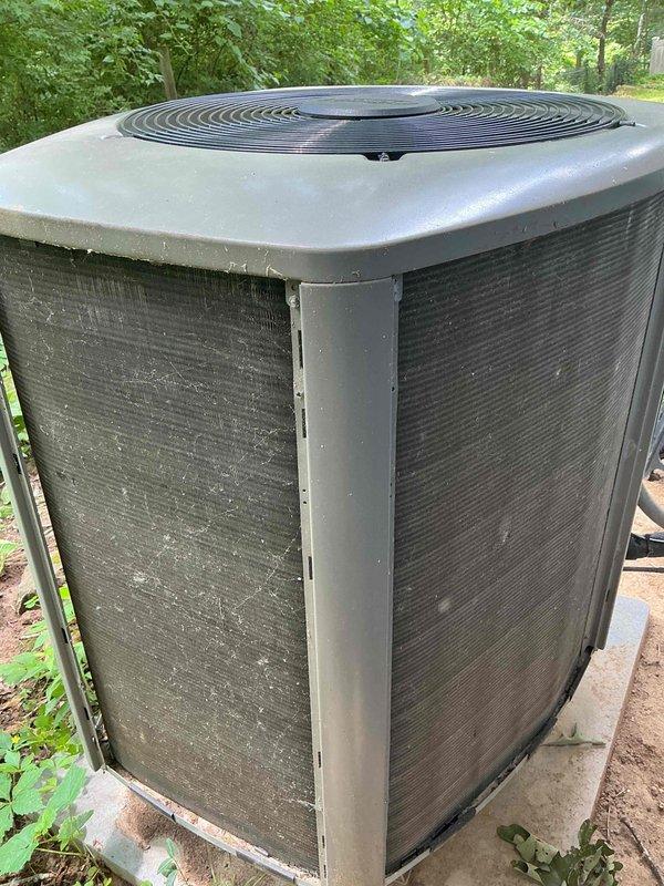 Completed annual cooling system tune-up on a 9-year-old Lennox outdoor condensing unit. Performed comprehensive maintenance including inspection of electrical components, control board, and wiring connections; cleaned heavily soiled condenser coils and exterior fins; checked refrigerant levels and operating pressures; verified proper operation of compressor and condenser fan motor; and tested all safety controls and thermostat response. Unit returned to normal operating condition with improved efficiency following removal of accumulated dirt, debris, and vegetation buildup from exterior surfaces and heat exchange components.