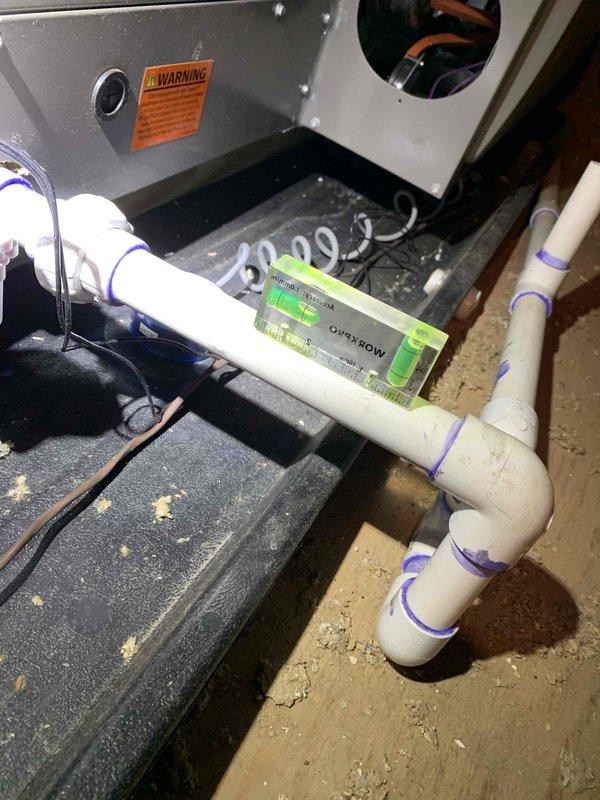 Completed callback to replace faulty wet switch on attic air handler unit with hockey puck style safety switch. Removed and discarded original wet switch that was installed during previous new installation. Installed replacement condensate safety switch on primary drain line, verified proper operation and electrical connection. Unit tested and operating normally with new safety device functioning correctly.