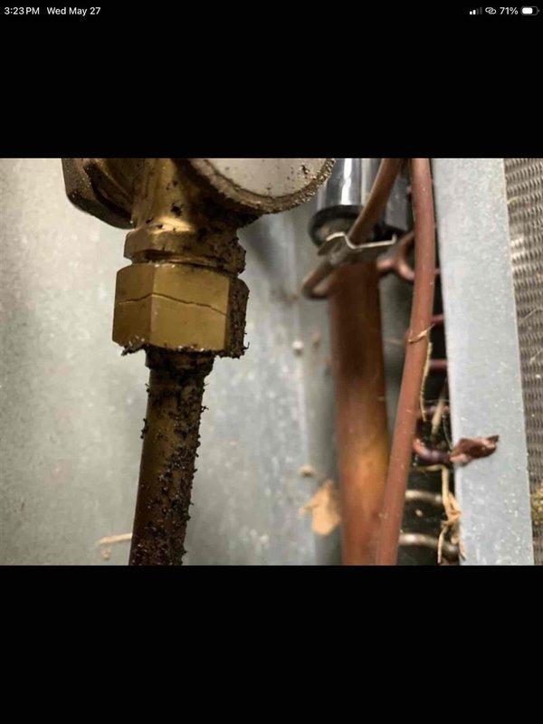 Responded to callback for second HVAC unit not reaching set temperature after previous diagnostic visit. Upon arrival, discovered unit was not originally installed by our company, which explained persistence of cooling issues. Performed thorough inspection of 2024-manufactured system, documenting existing installation conditions including copper refrigerant lines, coil configuration, and connection points. Photographed corroded brass fittings, aged copper piping with visible wear patterns, and system components showing signs of improper installation or maintenance. Advised customer of findings and recommended next steps for resolution.