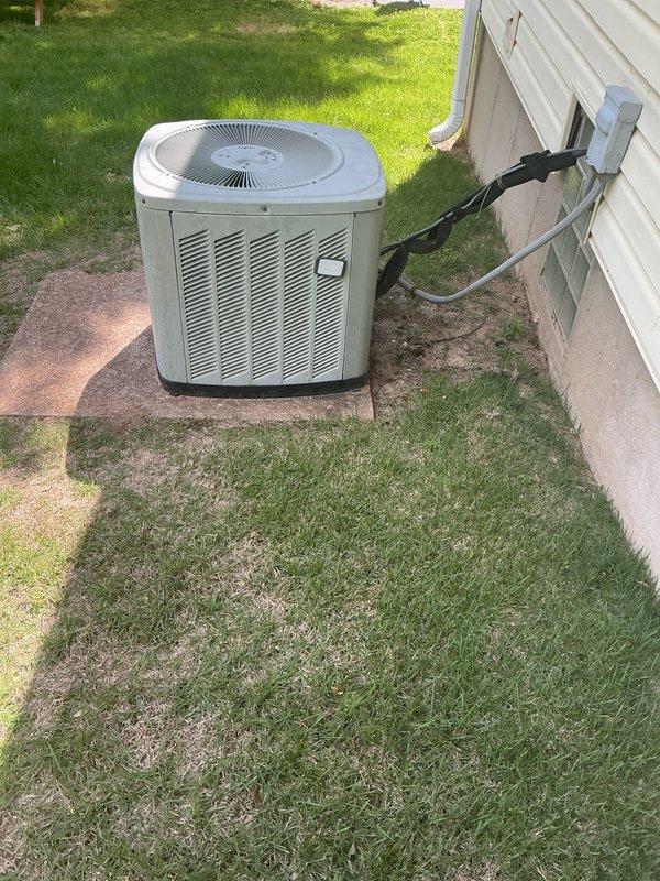 Responded to no-cooling complaint on residential system over 20 years old. Performed comprehensive diagnostic evaluation of single-zone HVAC system including outdoor condensing unit located in side yard and indoor air handler in basement utility area. Inspected refrigerant lines, electrical connections, and overall system operation. Documented equipment condition with photos showing aged outdoor unit on concrete pad and indoor components with visible ductwork and condensate drainage. Provided second opinion assessment on system's inability to maintain desired temperature setpoint and discussed findings with homeowner regarding performance limitations of aging equipment.