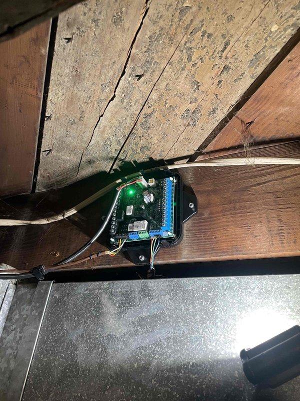 Responded to recall on unit under one year old reported as not kicking on. Upon arrival, inspected system and control board mounted in attic space. Verified all electrical connections at circuit board terminal block were secure, checked wire terminations, and confirmed proper mounting of control assembly. Tested system operation and verified unit cycled properly with no further issues observed.