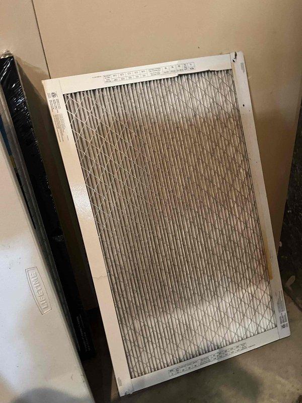 Responded to no cooling complaint on 15-year-old ground-level unit running constantly and blowing warm air. Upon inspection, found severely clogged air filter restricting airflow, causing reduced system efficiency and inadequate cooling. Replaced dirty filter with new unit. Performed system diagnostics using refrigerant manifold gauge set to verify proper refrigerant pressures, temperatures, and overall system performance. Confirmed unit operating within normal parameters following filter replacement. System restored to proper cooling operation.