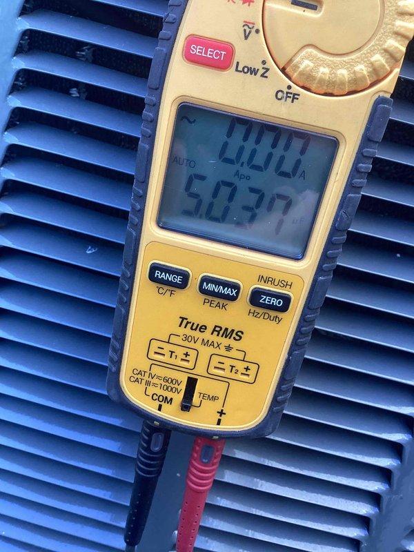 Completed comprehensive cooling system tune-up on 4-year-old ground-level AC unit. Performed standard maintenance protocol including amperage draw verification showing 2.0A at condenser, temperature differential measurements indicating 26.9°F and 270.2°F readings across system components, and visual inspection of all accessible equipment. All measurements within manufacturer specifications; unit operating efficiently with no deficiencies noted.