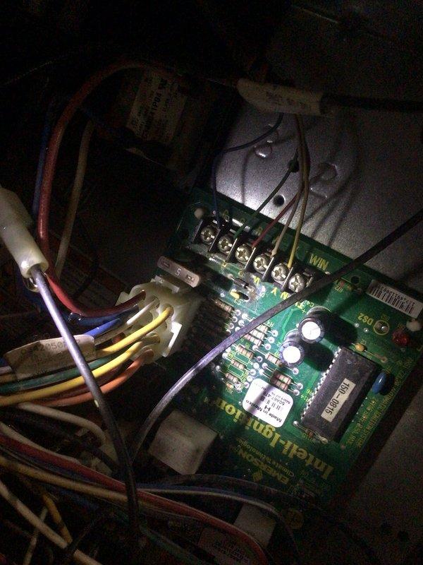 Responded to no-cooling emergency call for Goodman system running continuously without cooling the home. Upon inspection, accessed control board and internal components to diagnose the issue. Performed troubleshooting of electrical connections, control circuit, and system operation. Inspected blower motor assembly, gas valve connections, and associated wiring harnesses for proper function. Documented system conditions with photos of control board wiring and internal mechanical components for service records.
