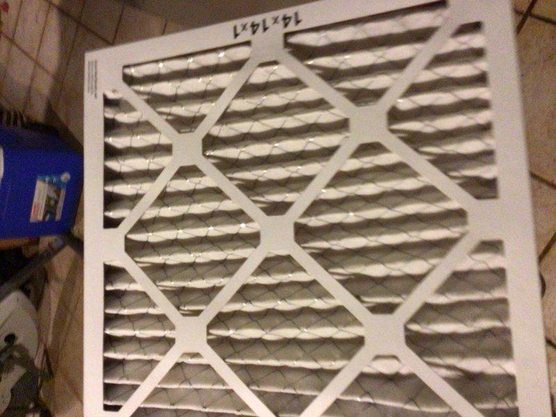 Performed comprehensive spring tune-up on Lennox 16 SEER 2-ton single-stage cooling system with warranty coverage through July 2028. Inspected and serviced all major components including condenser coil, evaporator coil, and air filtration system; noted moderate dust accumulation on filter media and vertical staining patterns on condenser fins indicating environmental exposure and normal operation. Verified system operation, confirmed all parameters within manufacturer specifications, and advised routine maintenance schedule to maintain warranty compliance.