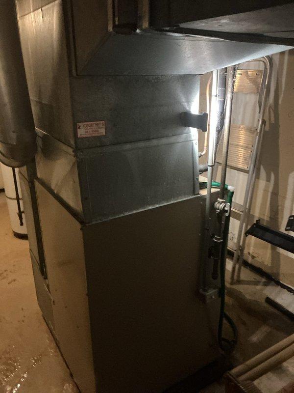 Responded to service call for reported leak at basement air handler unit. Upon inspection, located and repaired refrigerant leak on 10+ year old system. Inspected outdoor condenser unit and indoor air handler, verified system integrity, and confirmed proper operation following repair.