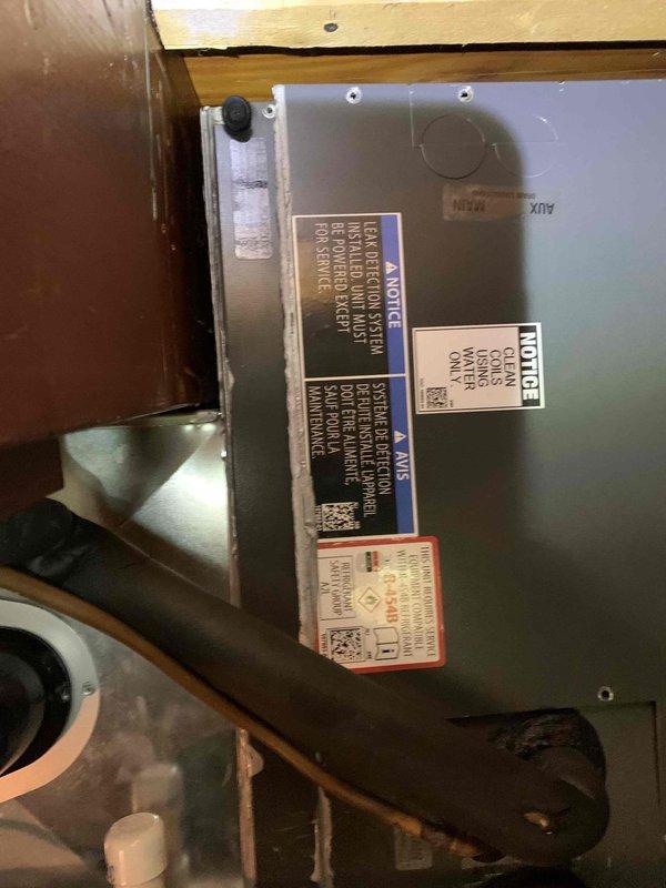 Responded to callback for intermittent system shutdown on 1-year-old unit installed in loft bedroom closet with high-pitched ceiling access. Customer reported thermostat screen going blank and unit cycling on for approximately one minute before shutting off, requiring manual reset to restart. This represents a repeat issue from previous service visit. Accessed air handler in attic space above bedroom closet, inspected unit for electrical faults, loose connections, and control board issues. Verified blower motor operation, checked voltage supply to thermostat, and tested safety switch circuits. Documented equipment condition with photos of attic-mounted air handler and closet access point for warranty review due to recurring failure pattern on recently installed system.