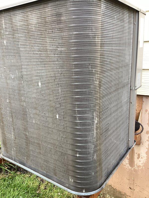 Completed preventative maintenance tune-up on an 11-year-old Lennox condenser unit (Model C33-40C-2F-6, Serial 6015M02093) located in side yard. Performed comprehensive system inspection including cleaning condenser coils, checking refrigerant levels and pressures, testing electrical components, verifying proper airflow through fins, and ensuring unit operates within manufacturer specifications. Unit found to be in good operational condition with all components functioning properly.