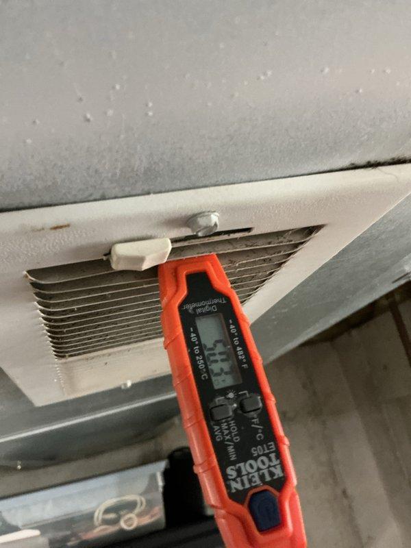 Completed comprehensive cooling system tune-up and maintenance on a 9-year-old air conditioning unit. Performed diagnostic testing using digital manifold gauges, recording refrigerant pressures with low side at 119.4 PSIG and high side at 275.4 PSIG, superheat at 14.8°F, and subcooling at 5.7°F. Inspected evaporator coil condition using thermal imaging tools and verified proper system operation with all parameters within acceptable ranges.