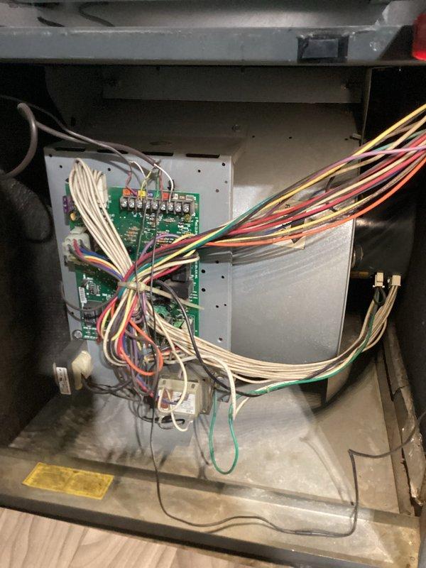 Performed comprehensive tune-up maintenance on HVAC system with model number F58702841. Inspected control board wiring and electrical connections, verified proper operation of circuit boards and ribbon cable connections, and replaced air filtration media with new pleated filters. Updated equipment age documentation and confirmed system operational parameters within manufacturer specifications.