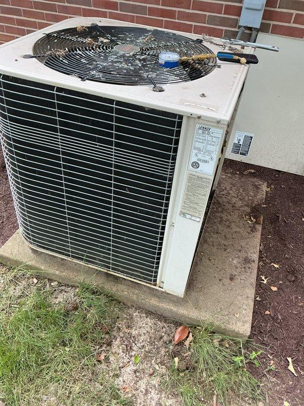 Responded to no cooling complaint on 23-year-old residential air conditioning system. Upon arrival, observed outdoor condenser unit experiencing fan motor failure - compressor would start but condenser fan would slow down and stop, preventing proper heat rejection and system cooling. Diagnosed failed condenser fan motor on aging outdoor unit. Performed necessary repairs to restore cooling operation to the residence.