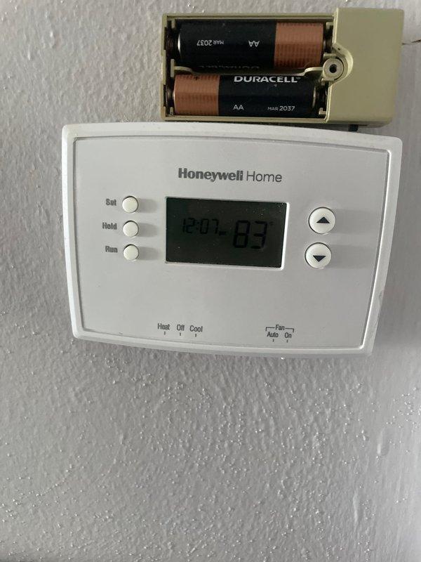 Responded to no cooling complaint on 7-year-old Alliance furnace system. Upon arrival, found Honeywell thermostat with dead batteries causing loss of communication between thermostat and HVAC system. Replaced batteries in thermostat, restoring power and proper operation. Verified thermostat display functioning correctly and system responding to temperature calls. Tested cooling cycle operation and confirmed AC unit engaging properly with adequate airflow through registers.