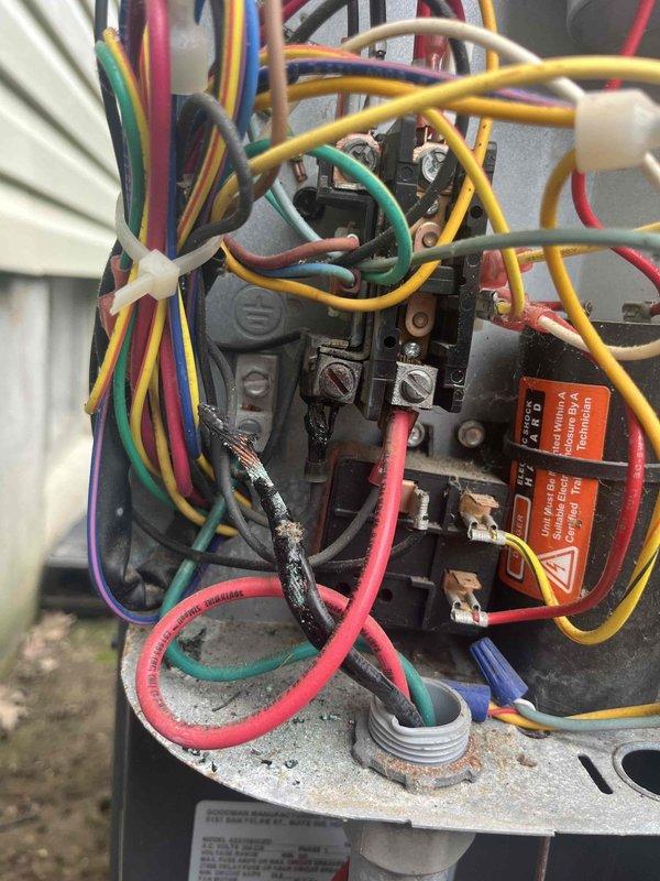Responded to no cooling call on 10+ year old ground-level unit. Upon inspection, discovered severely corroded and burned wire connection in the electrical control panel, which was preventing the contactor from engaging properly. Cleaned and repaired the damaged wire connection, secured all loose wiring, and tested contactor operation. System restored to normal cooling operation with all electrical connections functioning safely.