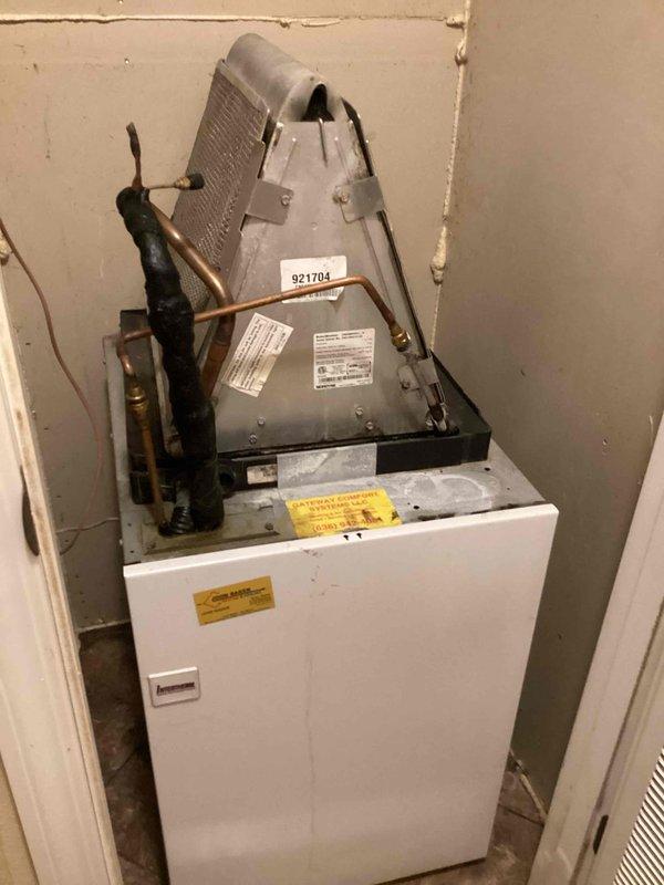 Responded to no cooling call with reported evaporator coil freezing issue. Upon arrival, found 2015 system with history of repeated coil freeze-ups. Performed diagnostic evaluation of indoor air handler and evaporator coil assembly, checked airflow across coil, and measured system temperatures and pressures. Documented equipment conditions with photos showing evaporator coil configuration, refrigerant line connections, and system components. Customer had been previously advised to turn off cooling system and run fan only to allow coil to thaw before service arrival.