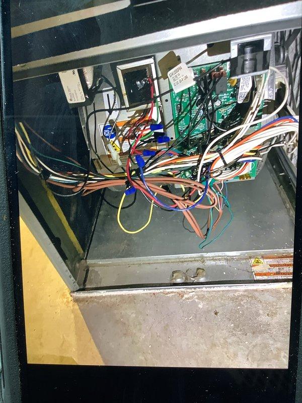 Responded to no cooling call on 10-year-old residential air conditioning system. Upon arrival, found outdoor condensing unit heavily soiled with significant dirt and grime accumulation on exterior surfaces and coil fins. Opened electrical control panel to diagnose condenser failure and inspected internal wiring, circuit boards, and electrical connections. Troubleshot system components to identify root cause of condenser malfunction and determine necessary repairs to restore cooling operation.