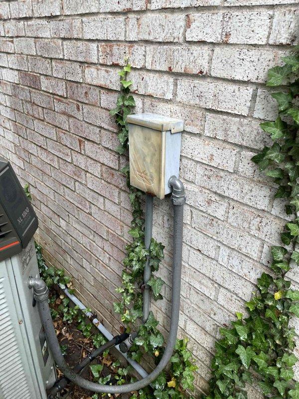 Responded to no cooling call on residential split system over 10 years old located on side of home. Upon arrival, performed diagnostic evaluation of outdoor condensing unit and electrical components. Inspected disconnect box, conduit connections, and verified power supply at breaker panel. Unit found to require repairs to restore cooling operation. Documented equipment condition and discussed necessary repairs with customer for approval before proceeding with restoration work.