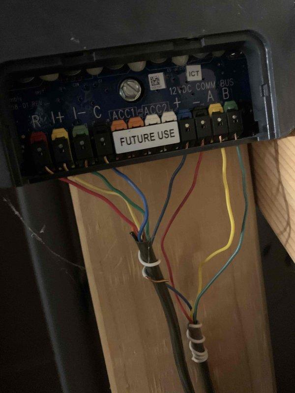 Responded to no cool call on 8-year-old residential unit located at ground level on side of home. Upon arrival, found system completely non-responsive with no cooling, no fan operation, and no thermostat activity. Inspected Everlast Infinite digital thermostat displaying 75°F with "Cool to 70" setpoint but unit failing to engage. Examined control board wiring at air handler, verifying all low-voltage connections at terminal strip including R, W, C, and communication bus terminals. Diagnosed thermostat communication failure preventing system operation. Restored proper thermostat-to-system communication, verified all wire terminations secure at control board, and tested system startup sequence. Confirmed compressor and blower motor engagement, proper airflow delivery, and cooling cycle initiation. System now operating normally with full functionality restored.