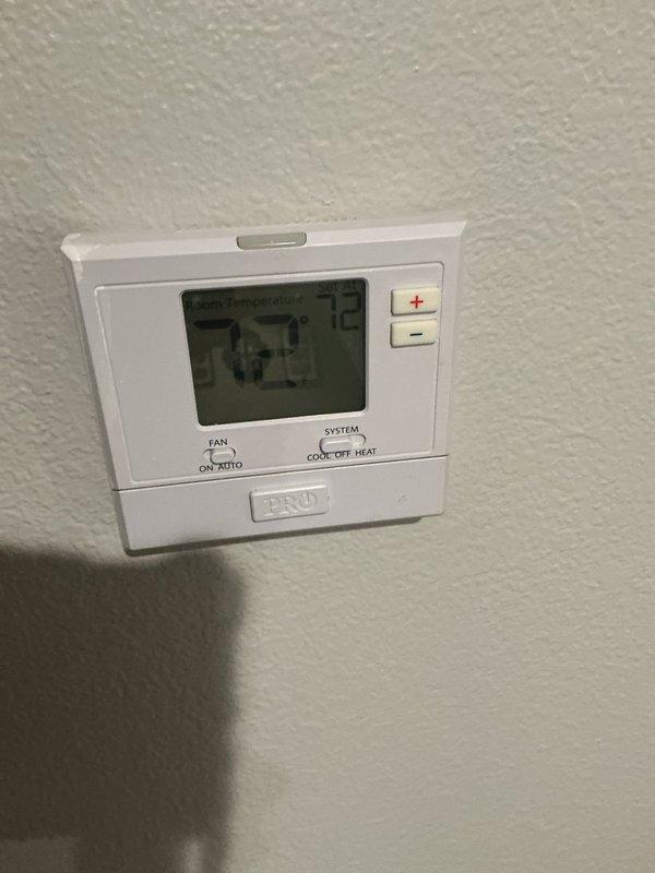 Completed comprehensive cooling system tune-up on residential air conditioning unit located at side of home. Performed full system inspection including electrical components, control board, wiring connections, and thermostat functionality. Verified proper airflow with 16x20x1 air filter in place and confirmed thermostat operation at 73°F with cooling mode engaged.