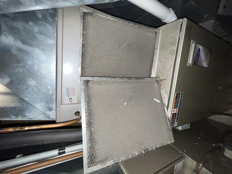 Responded to no-cool call on 14-year-old system located in basement. Upon arrival, found unit completely inoperative with no power to system. Inspection revealed severely deteriorated outdoor disconnect and burned wiring connections at exterior unit. Outdoor disconnect showed extensive fire damage with charred components and melted housing, creating unsafe electrical condition and preventing system operation. Replaced failed disconnect, repaired damaged wiring, and restored power to unit. Changed dirty air filter at indoor air handler. Tested system operation and confirmed proper cooling function restored. Unit now operating safely within normal parameters.