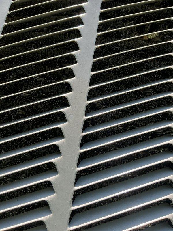 Completed scheduled cooling maintenance tune-up on HVAC system. Replaced dirty 16x20x1 air filter showing significant dust accumulation and discoloration. Cleaned return air grilles with visible debris buildup between louvers. System tested and confirmed operational upon completion.