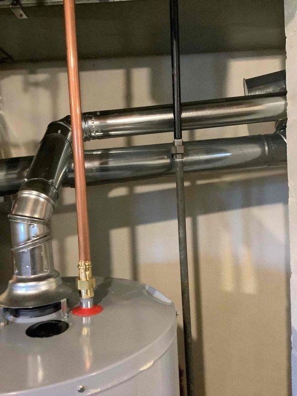 Installed a 40-gallon gas tall water heater in the mechanical utility room, including all necessary copper supply line connections with brass fittings and isolation valves. Configured the exhaust venting system with metallic ductwork and connected gas supply lines to manufacturer specifications. All plumbing connections were secured and tested to ensure proper operation and code compliance.