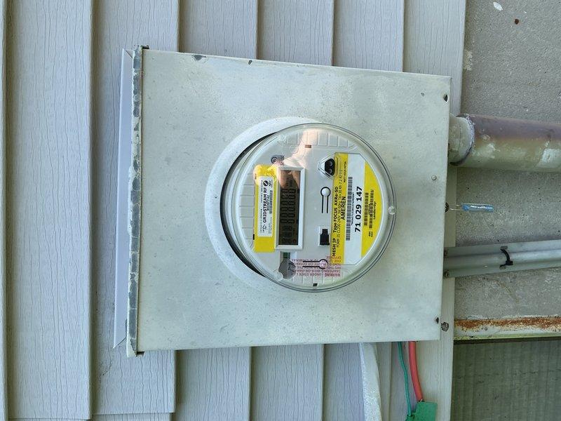 Responded to intermittent tripping issue affecting air conditioning unit at older electrical panel located in basement. Performed comprehensive inspection of main breaker panel and exterior meter base, evaluating breaker conditions, bus bar connections, and overall panel integrity. Documented panel configuration and exterior service entrance components with photographic evidence for assessment of aging electrical infrastructure and potential upgrade recommendations.