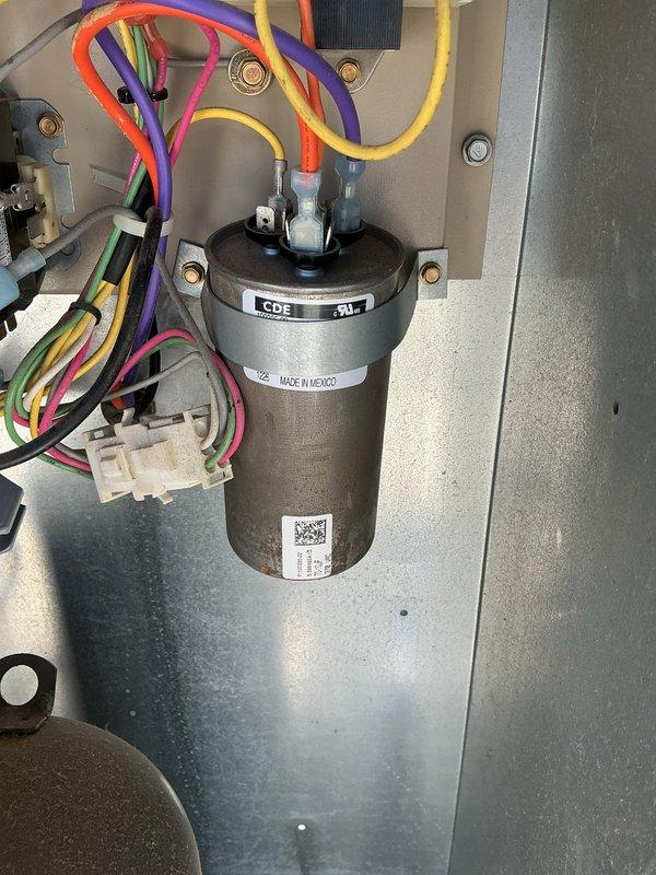 Replaced failed capacitor on blower motor for unit 250-8 and replaced both the blower motor capacitor and dual capacitor for the compressor on unit 250-9. All replacement capacitors were installed from truck stock, properly wired, and tested for correct operation. System confirmed operational for both heating and cooling functions, with failed components disposed of per standard procedures.