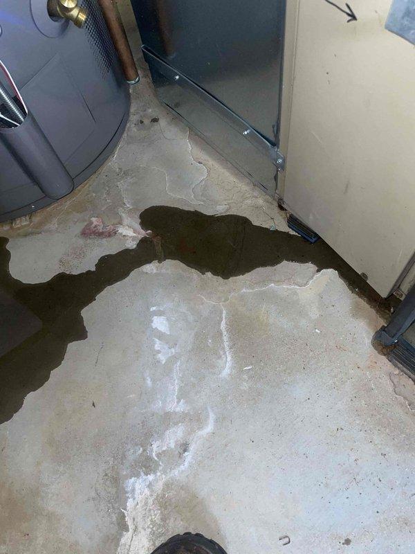 Responded to no cooling complaint on 7-year-old Lennox system with weak airflow. Upon inspection, discovered significant water damage and standing water on concrete floor near indoor air handler unit, indicating a clogged condensate drain line. Cleared drain line obstruction, verified proper drainage flow, and confirmed system returned to normal cooling operation with restored airflow.