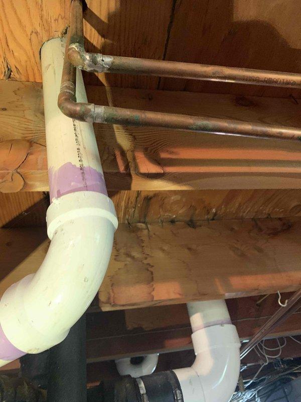 Completed estimated work to address clogged drain in main hall bathroom sink. Installed new sanitary tee connection from main stack to hall sink drain line, utilizing PVC piping with proper primer application. Work was performed over a four-hour timeframe to ensure proper drainage and resolve the reported clog issue.