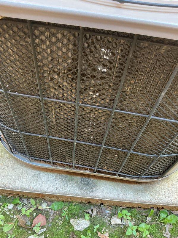 Completed preventive maintenance tune-up on residential air conditioning system, model CC8R43E-170L-068 utilizing R-410A refrigerant. Inspected evaporator coil assembly and exterior condenser unit, noting heavily soiled air filter requiring replacement due to significant dust and debris accumulation that could restrict airflow and reduce system efficiency. Documented equipment condition with photos showing 10-year-old unit located on side of home with accessible service panel and copper refrigerant lines in satisfactory condition.