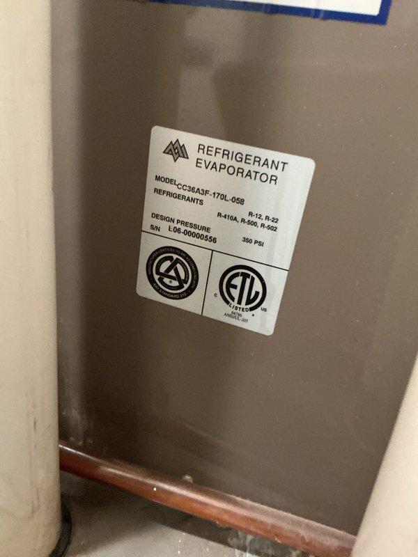 Completed preventive maintenance tune-up on residential air conditioning system, model CC8R43E-170L-068 utilizing R-410A refrigerant. Inspected evaporator coil assembly and exterior condenser unit, noting heavily soiled air filter requiring replacement due to significant dust and debris accumulation that could restrict airflow and reduce system efficiency. Documented equipment condition with photos showing 10-year-old unit located on side of home with accessible service panel and copper refrigerant lines in satisfactory condition.