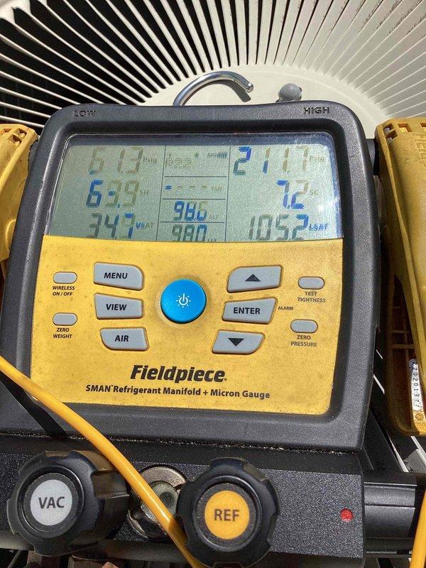 Responded to no-cool call on 26-year-old Lennox air conditioning unit. Found condensate drain line completely clogged, preventing proper drainage and causing system shutdown. Successfully cleared obstruction from drain hose using appropriate tools and verified proper water flow. Tested system operation with refrigerant manifold gauge, confirmed proper pressures and temperatures, and restored cooling function. Unit operating within normal parameters upon departure.