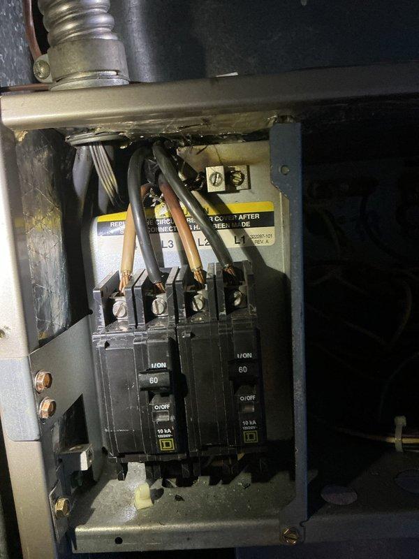 Responded to service call for second opinion regarding reported high voltage wire or breaker issue on residential air conditioning unit located in backyard. Upon arrival, performed thorough inspection of electrical disconnect box and main breaker panel serving the A/C system. Examined 60-amp double-pole breakers, high voltage wiring connections, and associated electrical components. All wiring terminations were found to be secure with proper torque, no signs of overheating, arcing, or damaged insulation observed. Circuit breakers tested and operating within normal parameters. Documented electrical panel configuration with photographic evidence showing proper wire management and breaker installation. System determined to be in safe operating condition with no immediate repairs required.