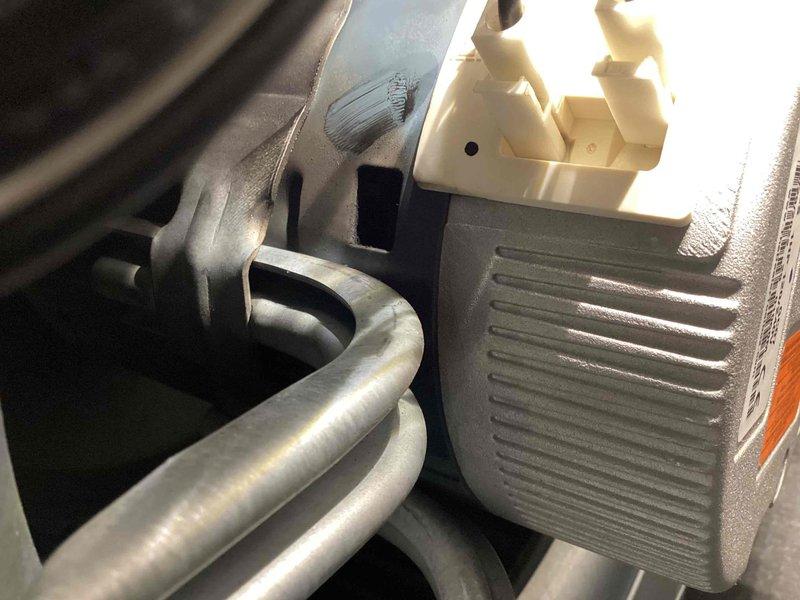 Responded to no cooling call with frozen refrigerant lines and unusual odor reported by customer. Upon inspection, found evaporator coil completely iced over due to restricted airflow caused by severely clogged air filter and dirty evaporator coil. Shut down system to allow ice to thaw, replaced disposable air filter, and thoroughly cleaned evaporator coil assembly. Verified blower motor operation and confirmed proper airflow restoration. Restarted system after complete ice melt, checked refrigerant pressures which returned to normal operating range, and monitored unit through complete cooling cycle with no further issues detected.